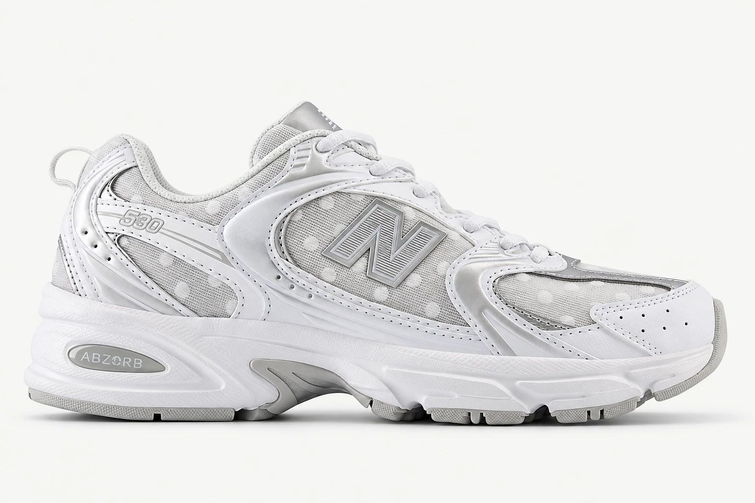 New Balance 530 in White / Silver Metallic, side view