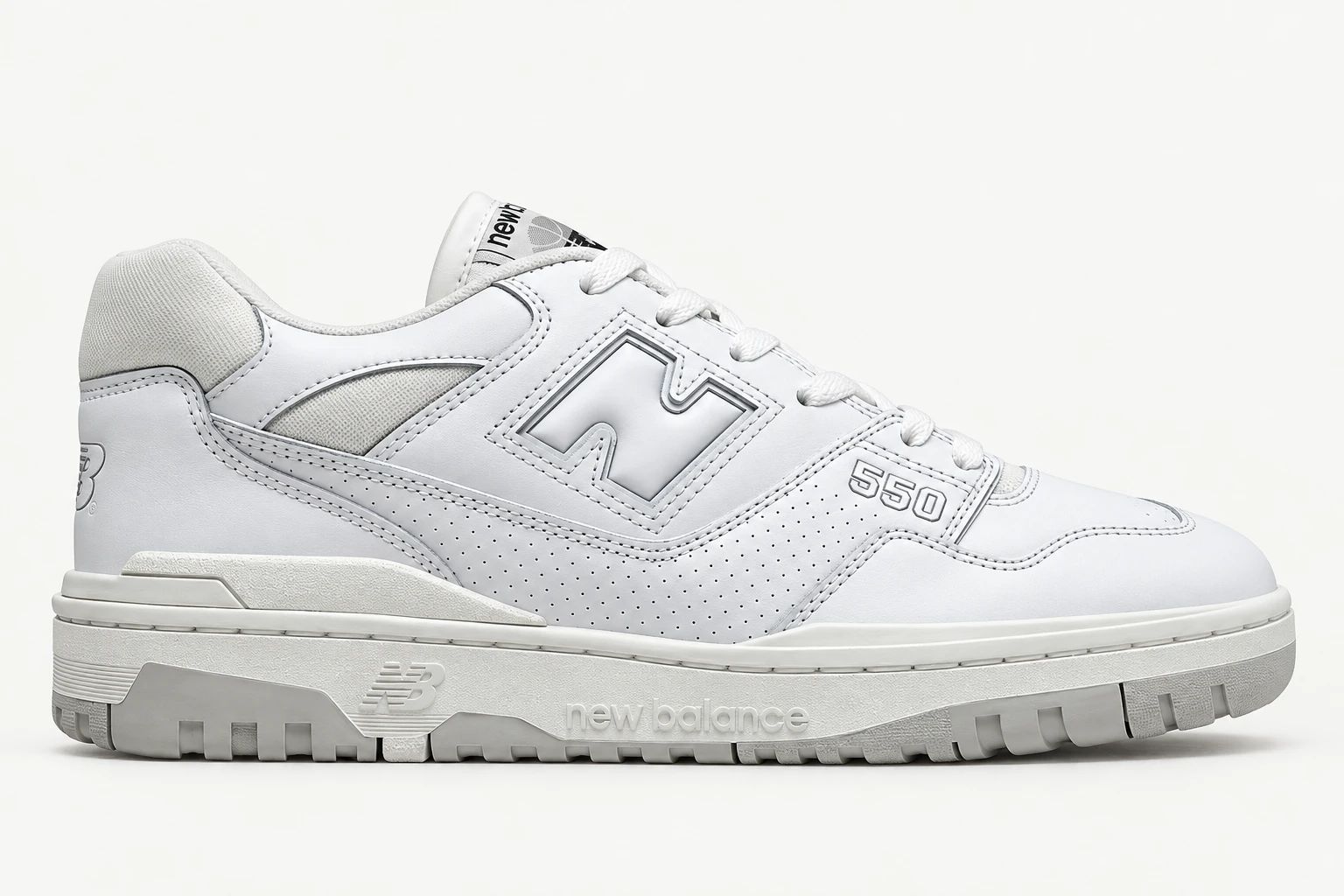 New Balance 550 in White / White, side view